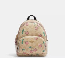 NUEVO CON ETIQUETAS COACH Mujer Mini Mochila de Corte Cuero Firma con Estampado de Corazón Cereza