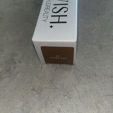 Base HUDA BEAUTY Glowish MultiDew Skin Tint - 09 BRONCEADO EXTRA - Auténtica