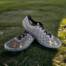 Picos de pista Under Armour HOVR Shakedown talla 10,5 gris halo/dorado (3022515-105)