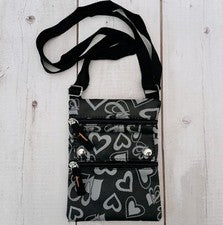 Mini bolso bandolera negro con corazones para mujer