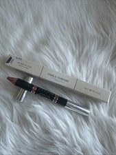 Lápiz labial Merle Norman Plus... La sombra es brandy melocotón... NUEVO