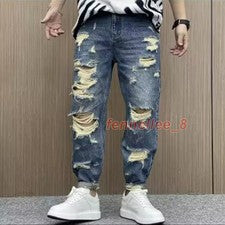Nuevos Pantalones de mezclilla rectos retro desgastados para hombre con agujeros rasgados Pantalones de moda