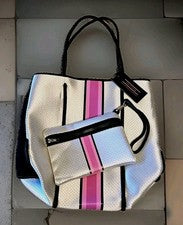 Bolso de Mano Haute Shore GREYSON Disco Rosa Plata Negro Neopreno y Muñequera Nuevo