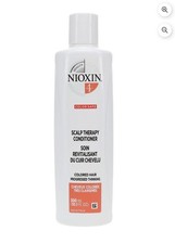 Acondicionador terapia cuero cabelludo Nioxin System 4 - Color seguro para adelgazamiento progresivo.