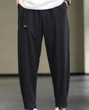 Pantalones deportivos de nueve puntos con cordón de moda sueltos informales de verano para hombre
