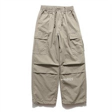Pantalones largos sueltos estilo retro para hombre cargo plisados con bandas al tobillo bolsillos talla