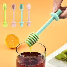 Cuchara de miel de plástico para uso diario en cocina