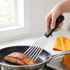 Volteador de pescado profesional de acero inoxidable con ranuras para freír
