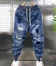 Nuevos Pantalones de mezclilla ajustados de moda para hombre Pantalones harén clásicos informales