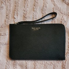 Muñequera Kate Spade de cuero negro