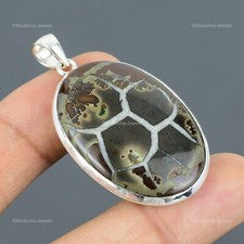 Joyería colgante boho artesanal de piedra fósil de grieta de barro marroquí ovalada de plata 925