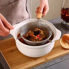 Pala de acero inoxidable con dobles orificios para colgar y mango de madera resistente 34 cm