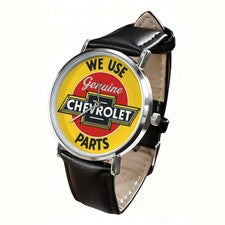 Utilizamos reloj pajarita Chevy con letrero de piezas originales Chevrolet