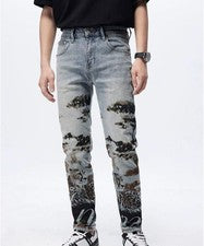 Pantalones de mezclilla azules ajustados transpirables estampados punk de pierna recta de moda para hombre