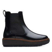 Botines Clarks ORIANNA W UP de cuero negro con cuña para dama