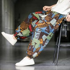 Pantalones harén retro chinos florales de moda juvenil para hombre Pantalones sueltos de verano