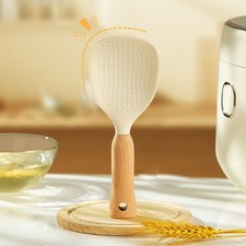 Cuchara de arroz cabeza de silicona con mango de madera natural y orificio para colgar integrado
