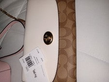 Bolso de hombro Coach marfil marrón con logotipo cadena cierre giratorio para mujer