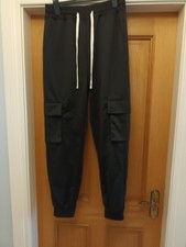 Jogger de carga utilitario negro para hombre con puños cintura elástica - talla S