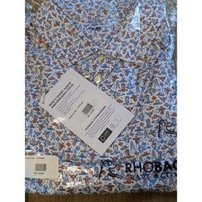 Nuevo con etiquetas Polo de golf Rhoback XXL Performance para hombre estampado Texas blanco naranja azul