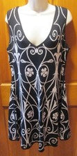 VESTIDO MUJER DISEÑADOR YOANA BARASCHI REVERSIBLE CALCE Y ACAMPANADO TALLA L