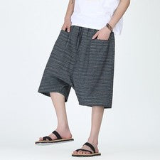 Hombres Pantalones Cortos Sueltos con Bolsillos Estilo Chino Cintura Elástica Medio Pantalones Entrepierna Caída