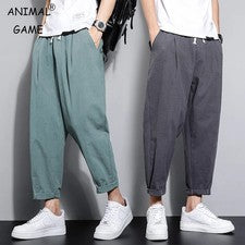 Pantalones informales transpirables para hombre Moda Calce suelto Pantalones holgados Pantalones elásticos boho