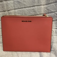 Muñequera sin asas Michael Kors rosa para mujer con detalles de cremallera
