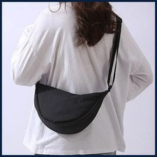 Bolso de hombro portátil de color liso para mujer simple acolchado de tela de nailon para mujer
