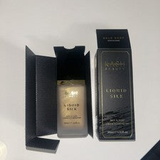Iluminador facial y corporal líquido de seda Kash Beauty nuevo y sellado maquillaje medio da