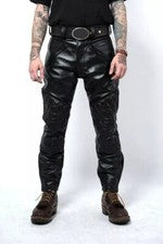 Pantalones de motociclista de cuero acolchados negros para hombre Pantalones occidentales de cuero de cordero suaves rea