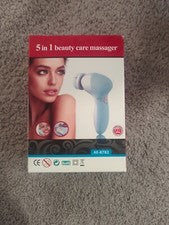 Masajeador para el cuidado de la belleza 5 en 1 nuevo en caja