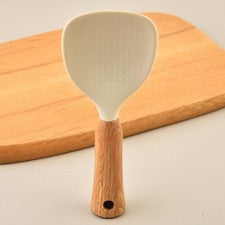 Cuchara de arroz de silicona con mango de madera resistente y práctico orificio para colgar