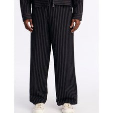 Pantalones NovaMen negros a rayas de pierna ancha con rayas blancas. Talla M.