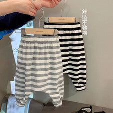 Pantalones de algodón para niños Leggings estilo fino pantalones sueltos para hombre y niña