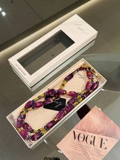 Correa de cadena para teléfono Karl Lagerfeld x La Coque Francaise tono dorado púrpura