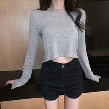 Camiseta para mujer de moda informal para el torso manga larga sección delgada cintura alta