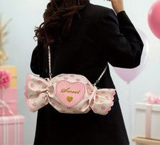 Mini bandolera para mujer en forma de caramelo con diseño de corazón y lunares