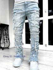 Pantalones de mezclilla estilo callejero elásticos medianos informales calce recto con borlas para hombre