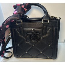 Mini bolso de mano Juicy Couture para mujer negro regaliz sosteniendo la línea nuevo con etiquetas $89