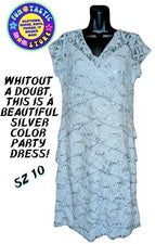 VESTIDO MUJER. CÓCTEL DE FIESTA. NIVELES DE ENCAJE PLATEADO. LENTEJUELAS, HASTA LA RODILLA, Talla 10.