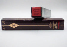 Varita iluminadora de belleza Charlotte Tilbury - Pinkgasm Sunset - Nueva en caja