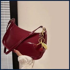 Bolso de mano de cuero PU para mujer versátil moda color liso cereza colgante hombro