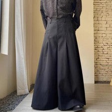 Pantalones informales góticos de pierna ancha con volantes sueltos de otoño de moda para hombres