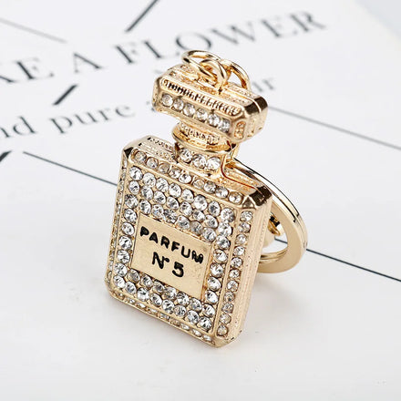 New Fashion Pearl Wristband Key Chain Creative Rhinestone Perfume Bottle Bow Keychain Female Cute Car Key Bag Pendant