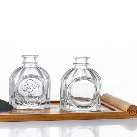 100ml Home Fragrance Diffuser Glass Bottle with Unique Embossed Design Flat Shape and Wooden Cap Pump Sprayer Seal