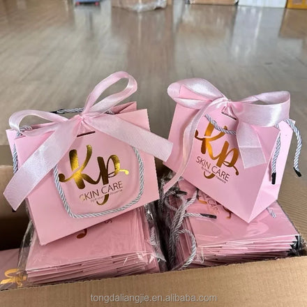 2025 Custom Paper Bags With Logo for Business Unique Embossing Packaging Paper Bag for Clothes