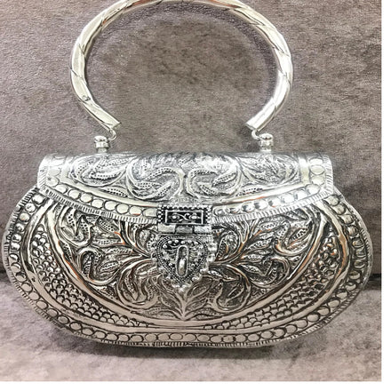 custom made brass embossed and engraved metal clutches for fashion accessory stores for resale