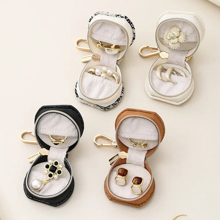 Portable Mini Travel Jewelry Box Simple New Round PU Leather Case for Pendant Earrings and Rings Keychain Included