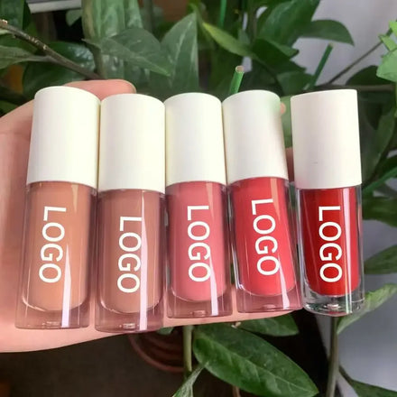 Best Selling Vegan Glossy Lip Plumping Tinted Oils Long Lasting Hydrating Smooth Shimmer Plump Lips Private Label